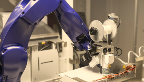 Gutenberg One Robotic Arm Applying glue with a glue gun