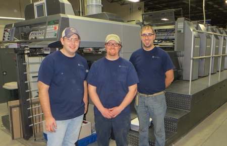 From left to right are Wausau press operators Dallas Ingersoll, Chris Habeck, and Mike Plisch.